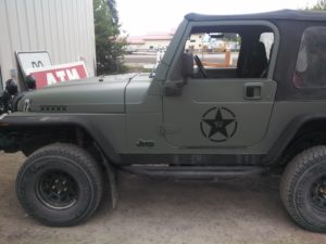 Olive Drab Jeep graphics installed